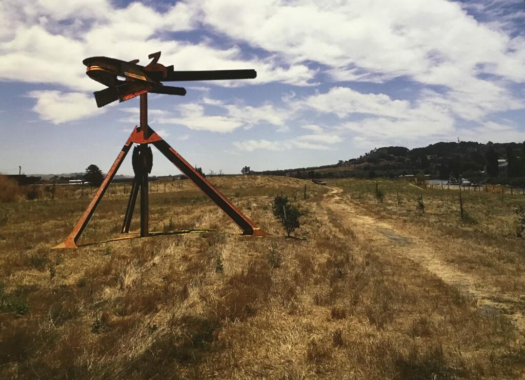 This photo illustration shows 'Huru,' a sculpture by Mark di Suvero, at Steamer Landing in Petaluma, a proposed location for the artwork. COURTESY CAROL MCKEGNEY