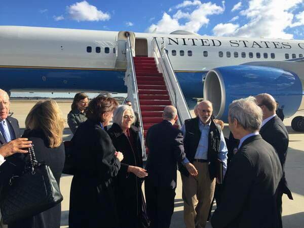 This handout photo from the Twitter account of Sen. Jeff Flake, R-Ariz. shows Alan Gross arriving at Andrews Air Force Base, Md., Wednesday, Dec. 17, 2014. The US and Cuba have agreed to re-establish diplomatic relations and open economic and travel ties, marking a historic shift in U.S. policy toward the communist island after a half-century of enmity dating back to the Cold War, American officials said Wednesday. (AP Photo/Sen. Jeff Flake)