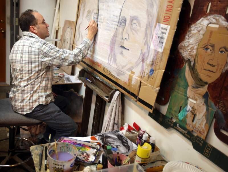 Artist and teacher Nick Mancillas works at his home in Santa Rosa. His new show runs through mid-September in the Window Gallery at the Art Museum of Sonoma County. (Christopher Chung/The Press Democrat.)