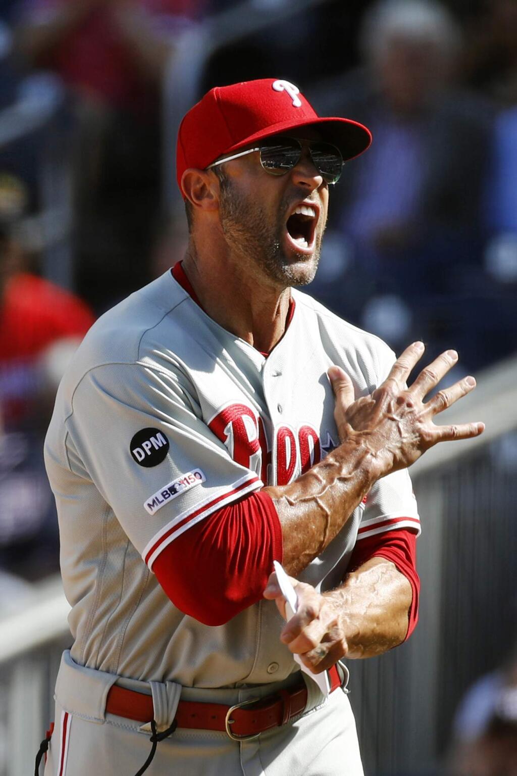 In this Sept. 24, 2019, file photo, Philadelphia Phillies manager Gabe Kapler reacts after Brad Miller was ejected by umpire Alan Porter after striking out looking in the sixth inning of the first baseball game of a doubleheader against the Washington Nationals, in Washington. (AP Photo/Patrick Semansky, File)
