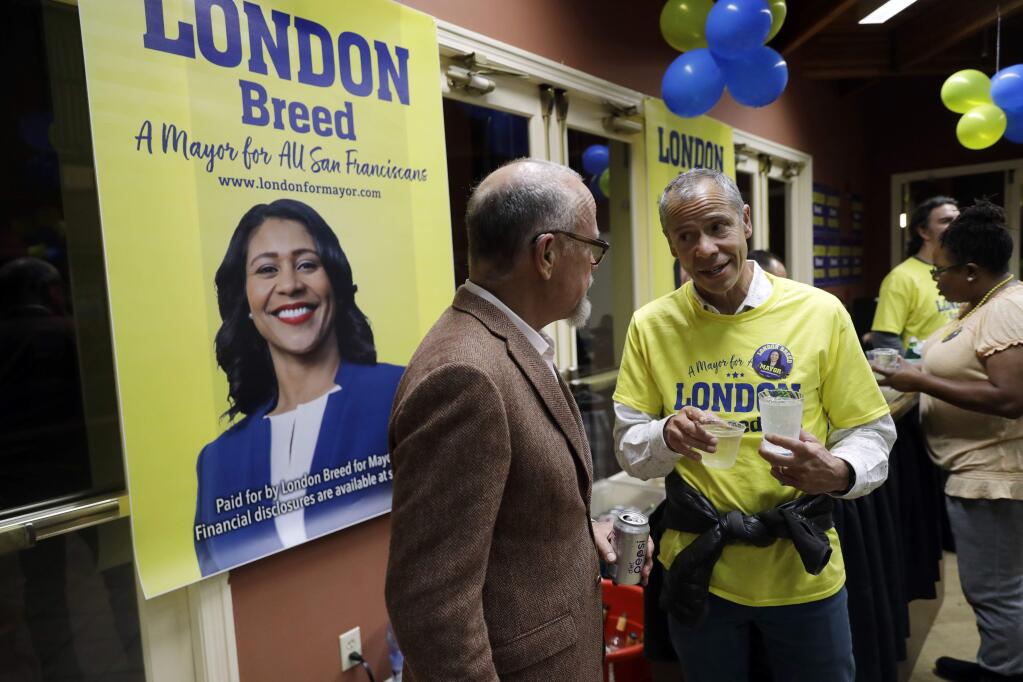 Supporters of San Francisco mayoral candidate London Breed chat at an election night party Tuesday, June 5, 2018, in San Francisco.(AP Photo/Marcio Jose Sanchez)