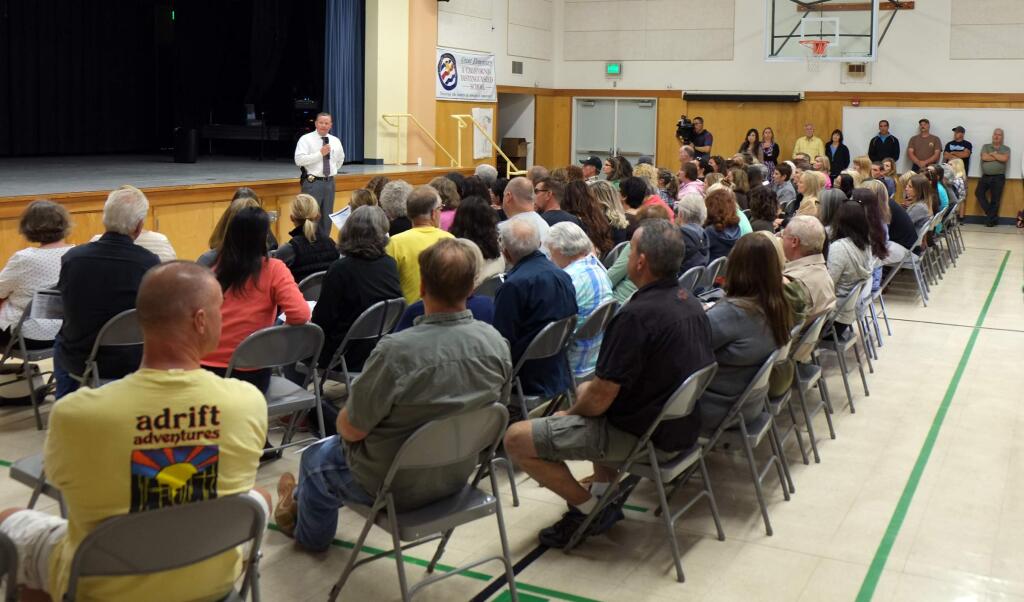 Petaluma Police Lt. Dan Fish updates hundreds of people on the ongoing investigation of a sexual assault in the Petaluma's Westridge neighborhood during a special community meeting on Sept. 29 at Grant Elementary School.