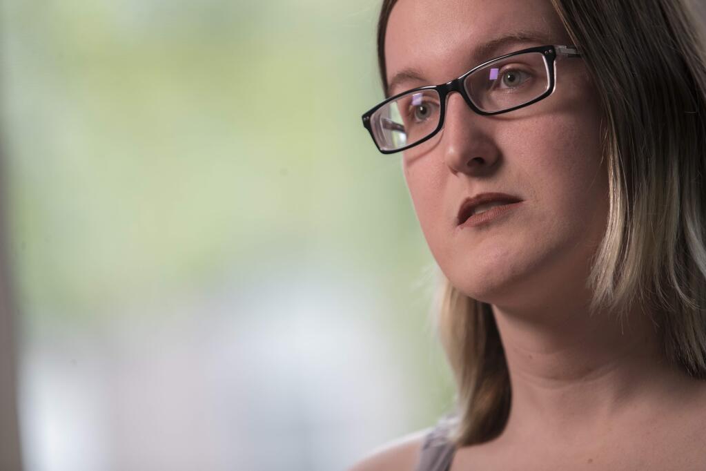 In this Wednesday, May 15, 2019, photo, Bailey Coffman is seen during an interview in New York. 'My gender's not a costume,' says Coffman, a 31-year-old transgender woman from New York. 'This story that I feel is very real. I lost a lot to be who I am, and I fought really hard for the body that I'm in.' (AP Photo/Mary Altaffer)
