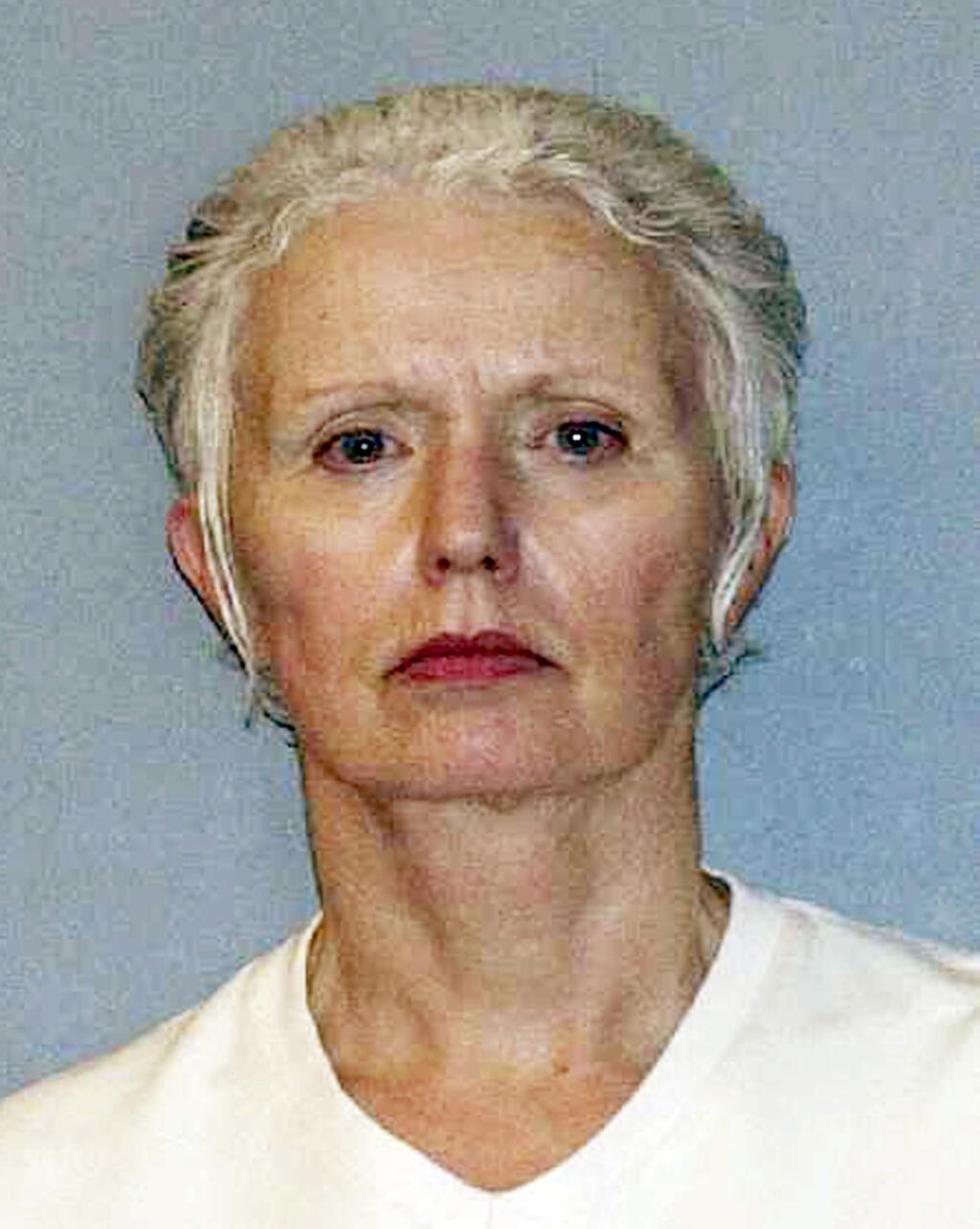 FILE - This undated file photo provided by the U.S. Marshals Service shows Catherine Greig, the longtime girlfriend of Whitey Bulger, who was captured with Bulger, June 22, 2011, in Santa Monica, Calif. Prosecutors will ask a federal judge to sentence the longtime girlfriend of Boston gangster James 'Whitey' Bulger to three more years in prison for refusing to testify about whether anyone else helped Bulger after he fled the city. Greig is scheduled to be sentenced Thursday, April 28, 2016, after pleading guilty to a criminal contempt charge for refusing to testify before a grand jury. (AP Photo/U.S. Marshals Service, File)