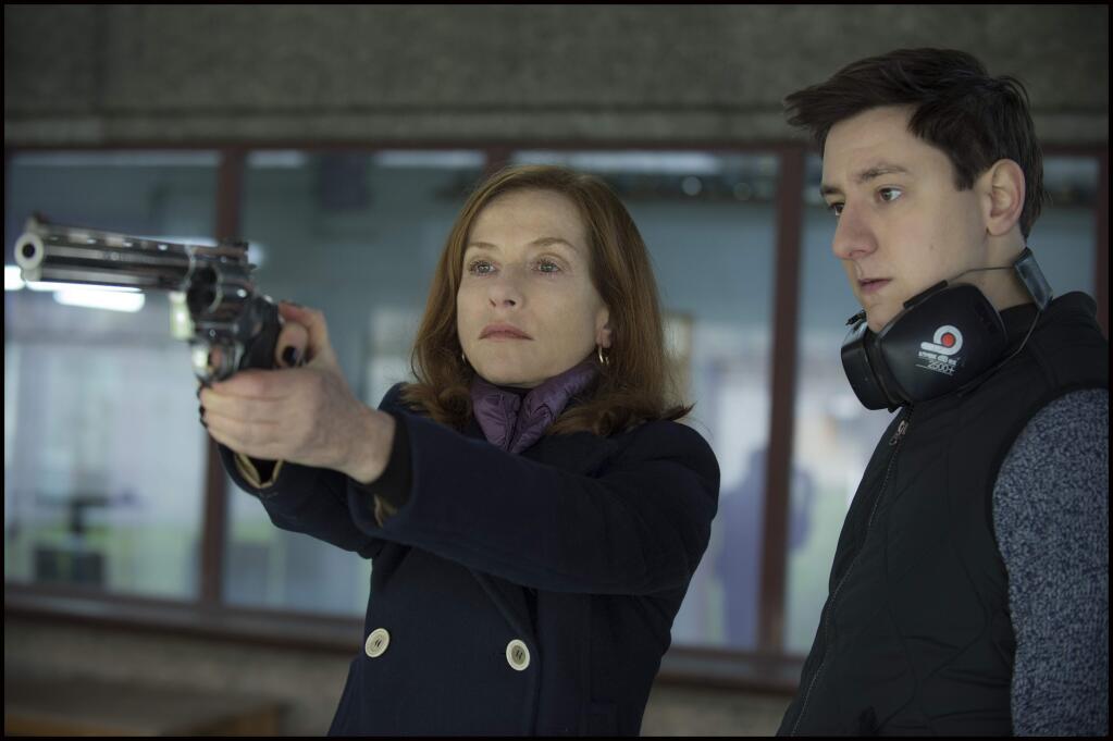 This image released by Sony Pictures Classics shows Isabelle Huppert, left, and Arthur Mazet in a scene from, 'Elle.' (Guy Ferrandis/Sony Pictures Classics via AP)
