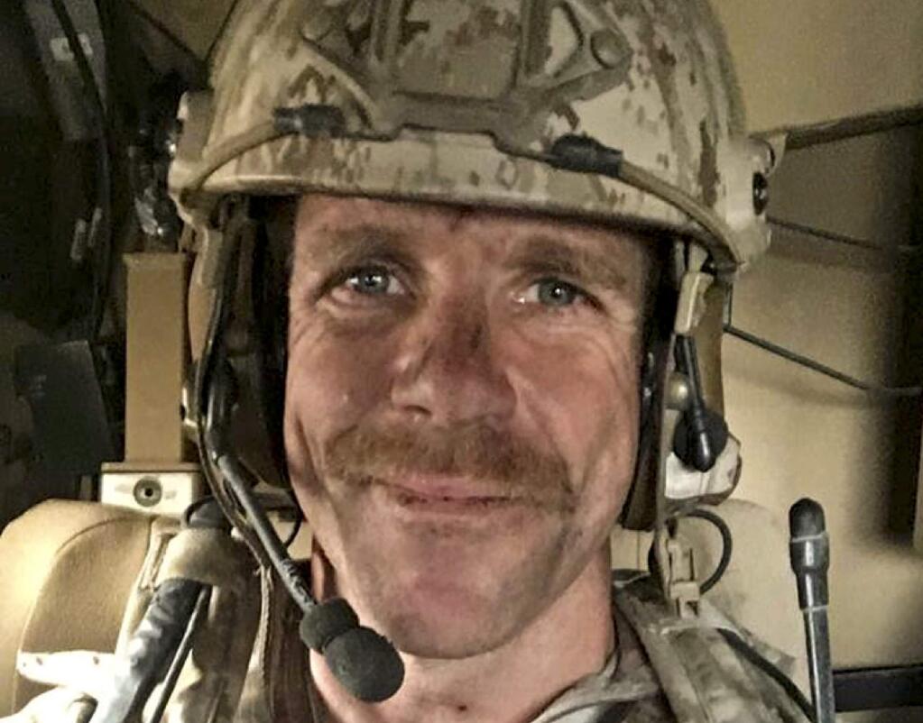 This undated selfie provided by Andrea Gallagher shows her husband, U.S. Navy SEAL Edward Gallagher, who has been charged with allegedly killing an Islamic State prisoner in his care and attempted murder for the shootings of two Iraq civilians in 2017. Gallagher is scheduled to go on trial Monday, June 17, 2019. (Edward Gallagher/Courtesy of Andrea Gallagher via AP, File)
