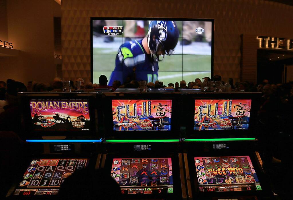 Video slots and big screen televisions at the Graton Resort and Casino in 2013. (KENT PORTER/ PD)
