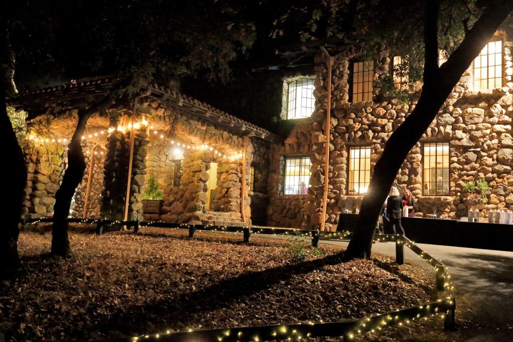 The House of Happy Walls, home of the Jack London State Historic Park museum, is illuminated during a reception for donors at the museum in Glen Ellen in 2018. (Alvin Jornada / The Press Democrat)