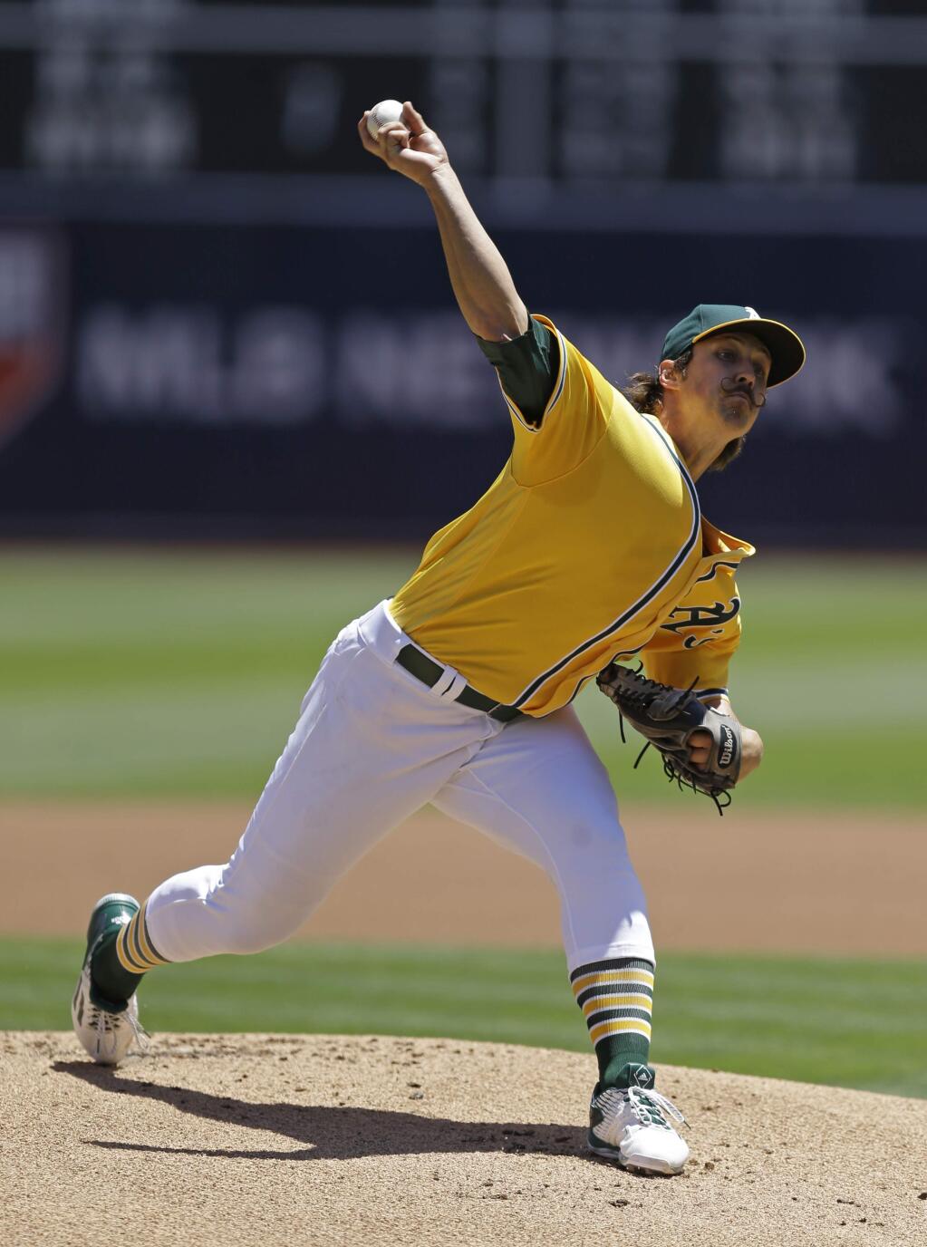 Oakland Athletics pitcher Daniel Mengden works against the Milwaukee Brewers in the first inning of a baseball game Wednesday, June 22, 2016, in Oakland, Calif. (AP Photo/Ben Margot)