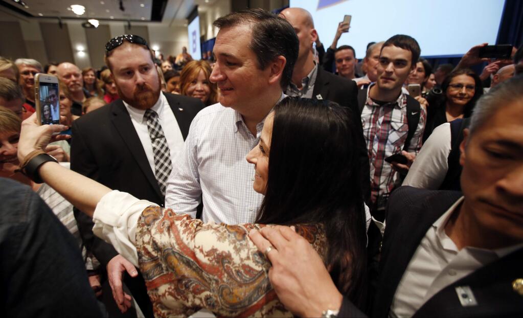 Republican candidate for president Sen. Ted Cruz greets supporters after speaking at a rally on the campus of Boise State University in Boise, Idaho, Saturday, March 5, 2016. (Joe Jaszewski/Idaho Statesman via AP)