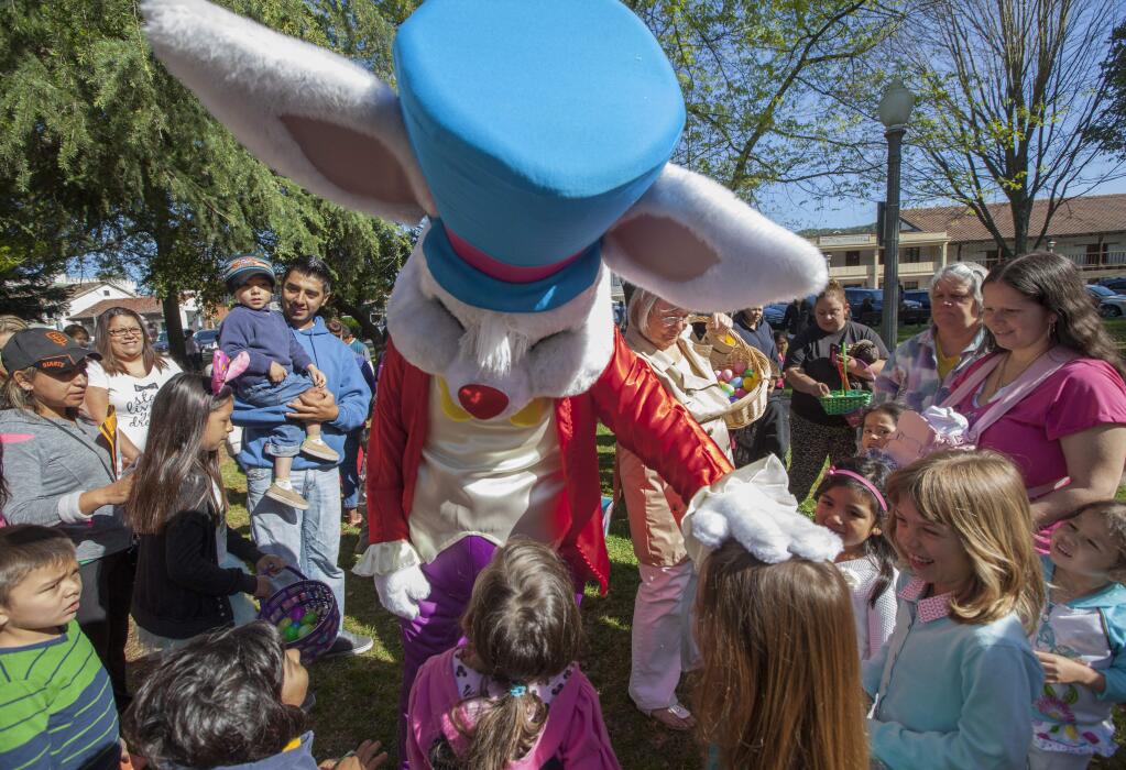 Following the egg hunt, Easter Bunny, aka Scott Andrews, enthralled the exhausted participants.On Saturday, the Soroptomists' Easter egg hunt on the Plaza once again delighted the Valley's children of all ages. (Photos by Robbi Pengelly/Index-Tribune)