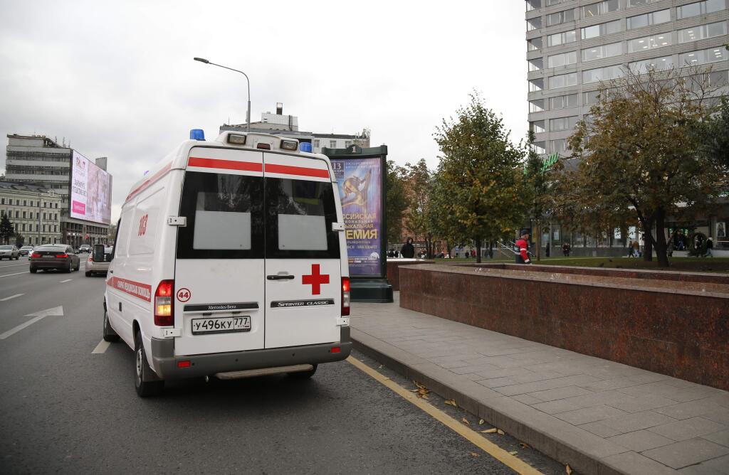 An ambulance leaves the Ekho Moskvy (Echo of Moscow) radio station office in Moscow, Russia, Monday, Oct. 23, 2017. Russia's Ekho Moskvy news radio station said on its website Monday that an assailant burst into its studios and stabbed Tatyana Felgenhauer who is best known for co-hosting a popular morning show .(AP Photo/Alexander Zemlianichenko)