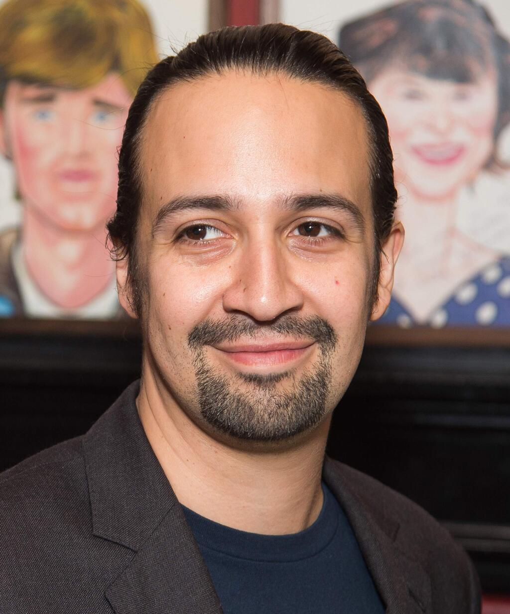 FILE - In this May 24, 2016 file photo, Lin-Manuel Miranda attends his Sardi's caricature unveiling at Sardi's restaurant in New York. Miranda will star with Emily Blunt in 'Mary Poppins Returns,' a sequel to the 1964 classic, which will be released on Dec. 25, 2018. (Photo by Charles Sykes/Invision/AP, File)