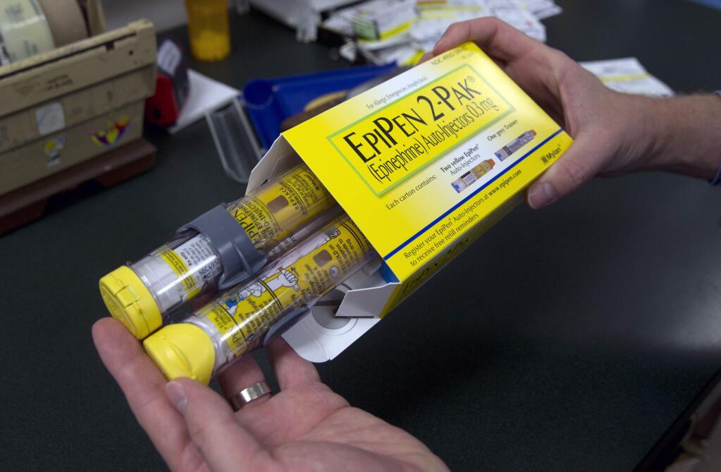 A package of EpiPens, an epinephrine autoinjector for the treatment of allergic reactions, costs $600, up from about $100 when Mylan acquired the patent in 2007. (RICH PEDRONCELLI / Associated Press)
