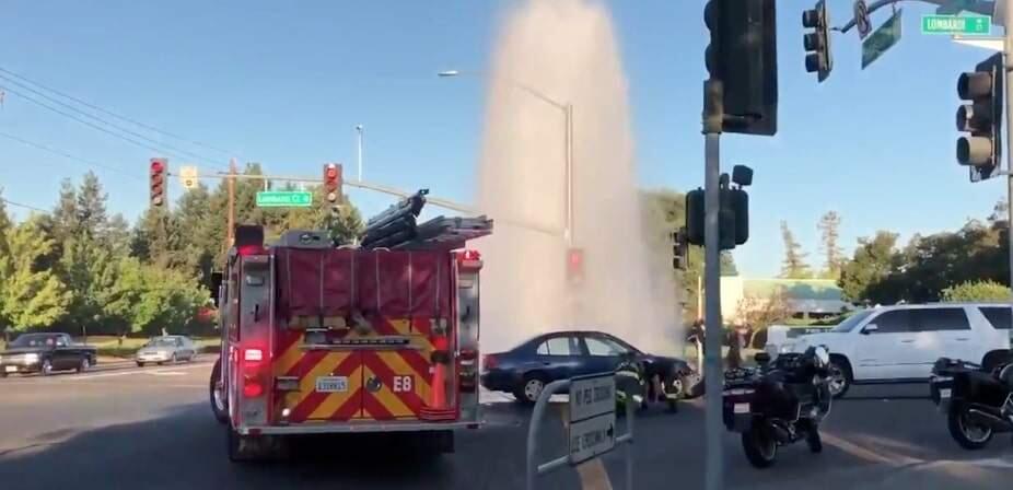 A car crash at Sebastopol Road and Lombardi Court Wednesday, Aug. 14, 2019, broke a fire hydrant and sent water gushing into the air. (Santa Rosa Fire Department Twitter)