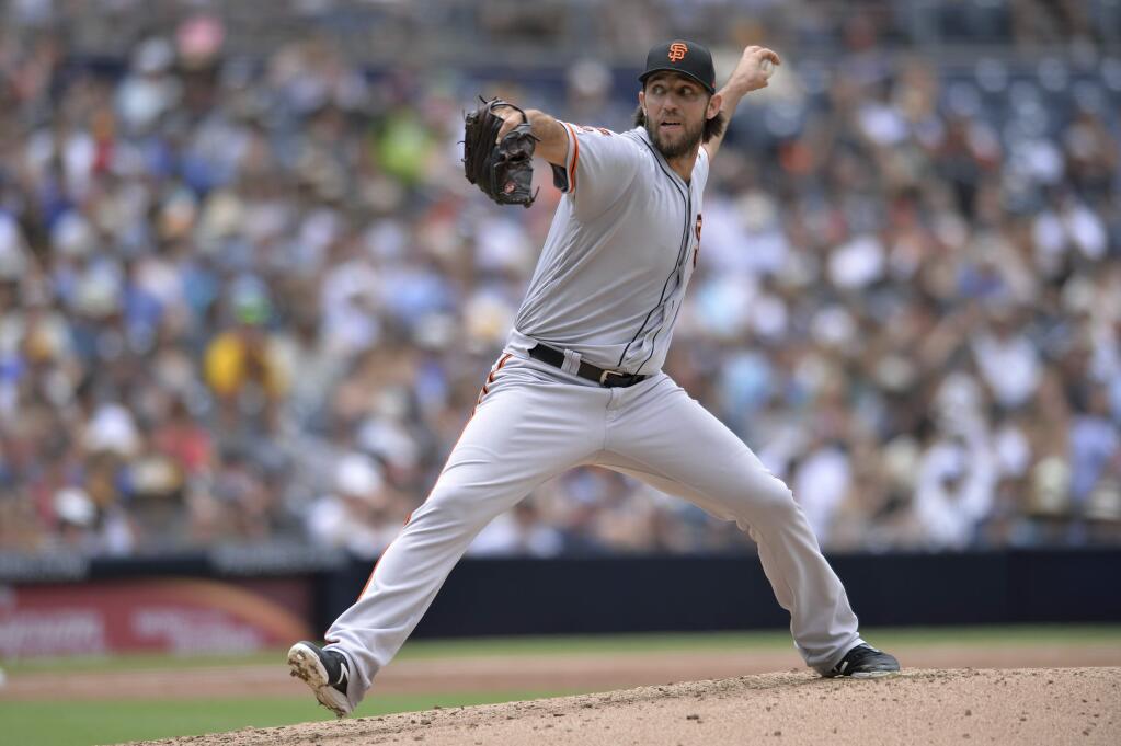 San Francisco Giants starting pitcher Madison Bumgarner works against a San Diego Padres batter during the second inning Sunday, July 28, 2019, in San Diego. (AP Photo/Orlando Ramirez)