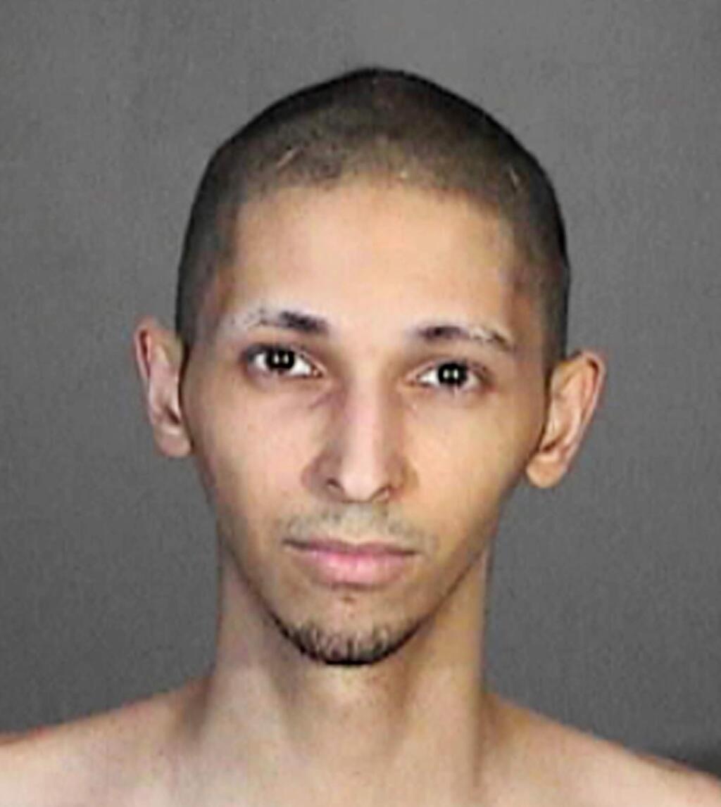 FILE - This 2015 file booking photo released by the Glendale, Calif., Police Department shows Tyler Barriss. Barriss, who is accused of making a hoax call on Dec. 28, 2017, that led to police shooting an unarmed man in Wichita, Kan., is scheduled to return to court Tuesday, May 22, 2018, in Wichita where a judge is set to decide if there is enough evidence to put him on trial for involuntary manslaughter and other charges. (Glendale Police Department via AP, File)