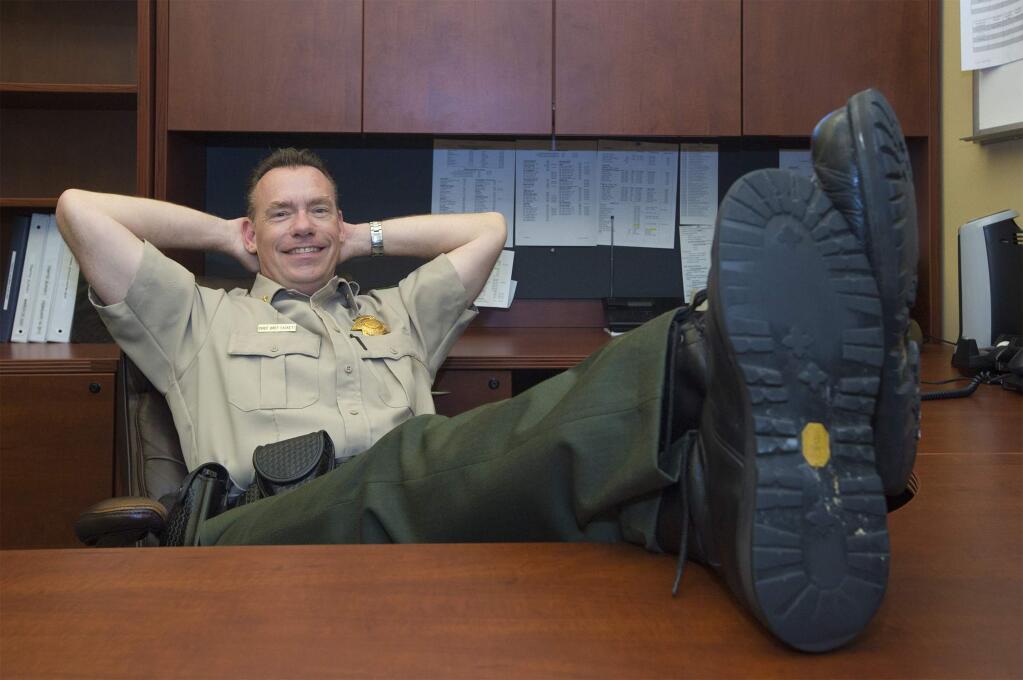Sonoma Police Chief Bret Sackett, whose official retirement date is July 15, chillaxes in his soon-to-be former office. (Photo by Robbi Pengelly/Index-Tribune)