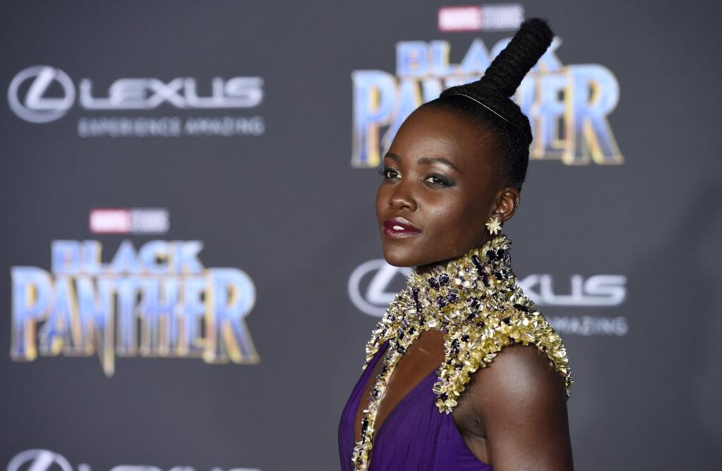 Lupita Nyong'o, a cast member in 'Black Panther,' poses at the premiere of the film at The Dolby Theatre on Monday, Jan. 29, 2018, in Los Angeles. (Photo by Chris Pizzello/Invision/AP)