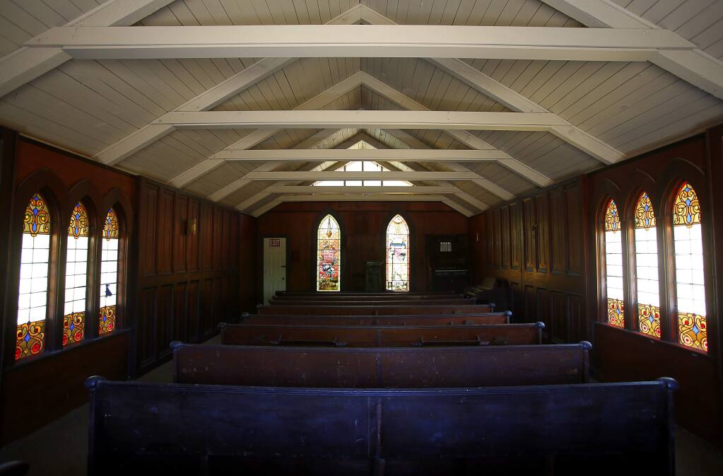 The interior of the small church on the Buzzard's Gulch at Cloverleaf property, in Santa Rosa on Friday, June 23, 2017. (Christopher Chung/ The Press Democrat)