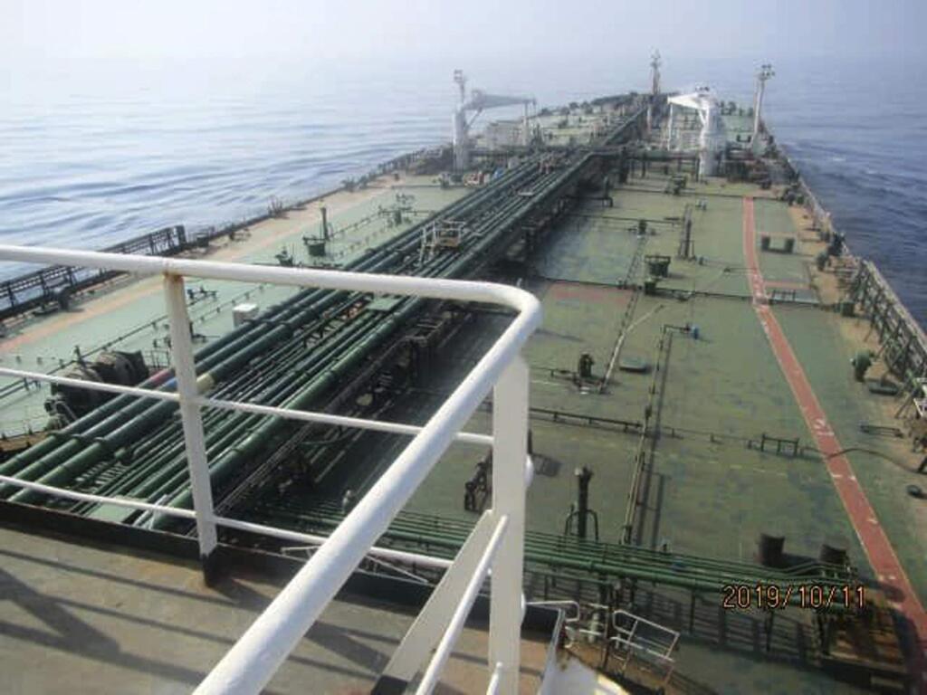 This photo released by the official news agency of the Iranian Oil Ministry, SHANA, shows Iranian oil tanker Sabiti traveling through the Red Sea Friday, Oct. 11, 2019. Two missiles struck the Iranian tanker Sabiti traveling through the Red Sea off the coast of Saudi Arabia on Friday, Iranian officials said, the latest incident in the region amid months of heightened tensions between Tehran and the U.S. (SHANA via AP)