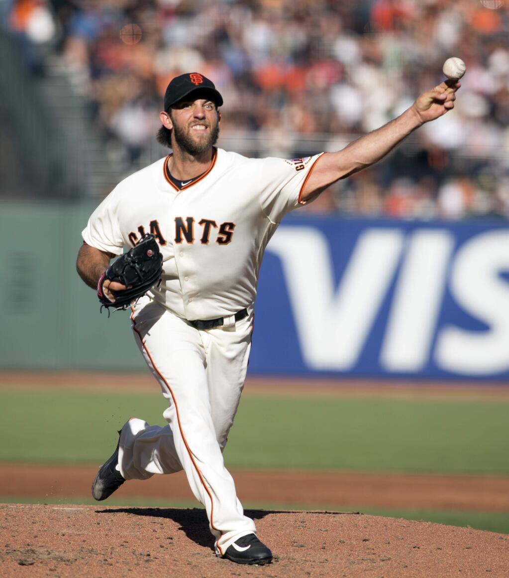 San Francisco Giants starting pitcher Madison Bumgarner delivers against the Arizona Diamondbacks during the third inning of a baseball game on Sunday, July 10, 2016, in San Francisco. (AP Photo/D. Ross Cameron)