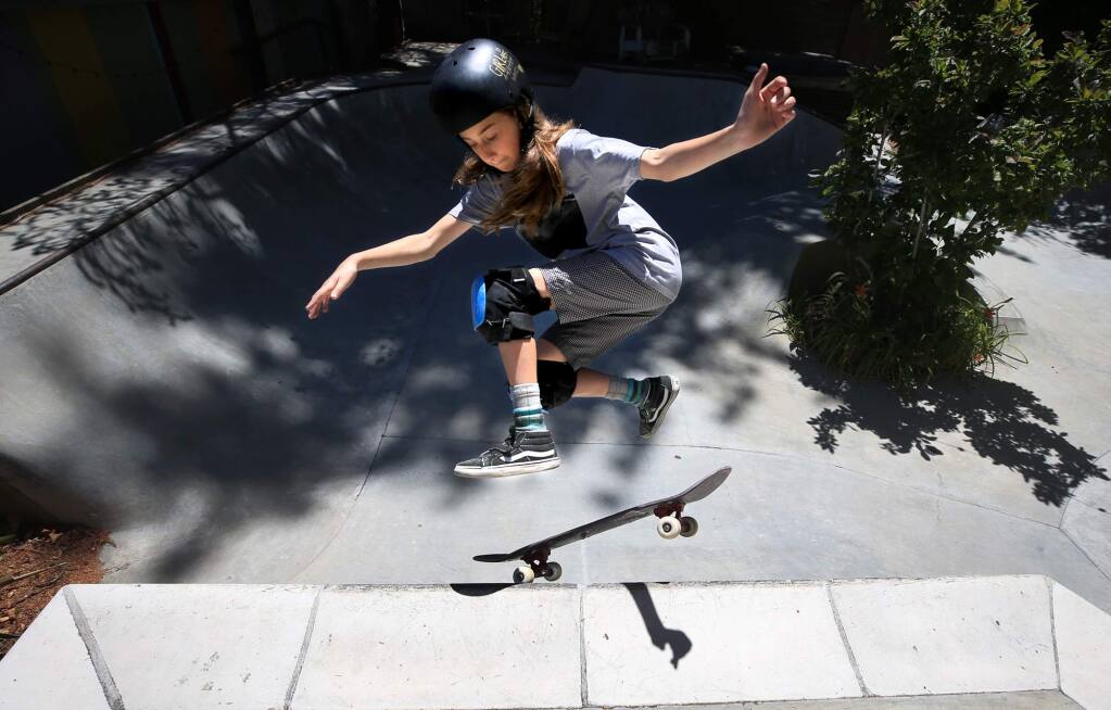 Minna Stess, an 11-year-old skateboarding phenom from Petaluma, will participate in an X Games qualifying competition this month. Stessa started skateboarding at the age of 2 and is only one of 20 athletes to be invited to the qualifier. (Kent Porter / The Press Democrat)