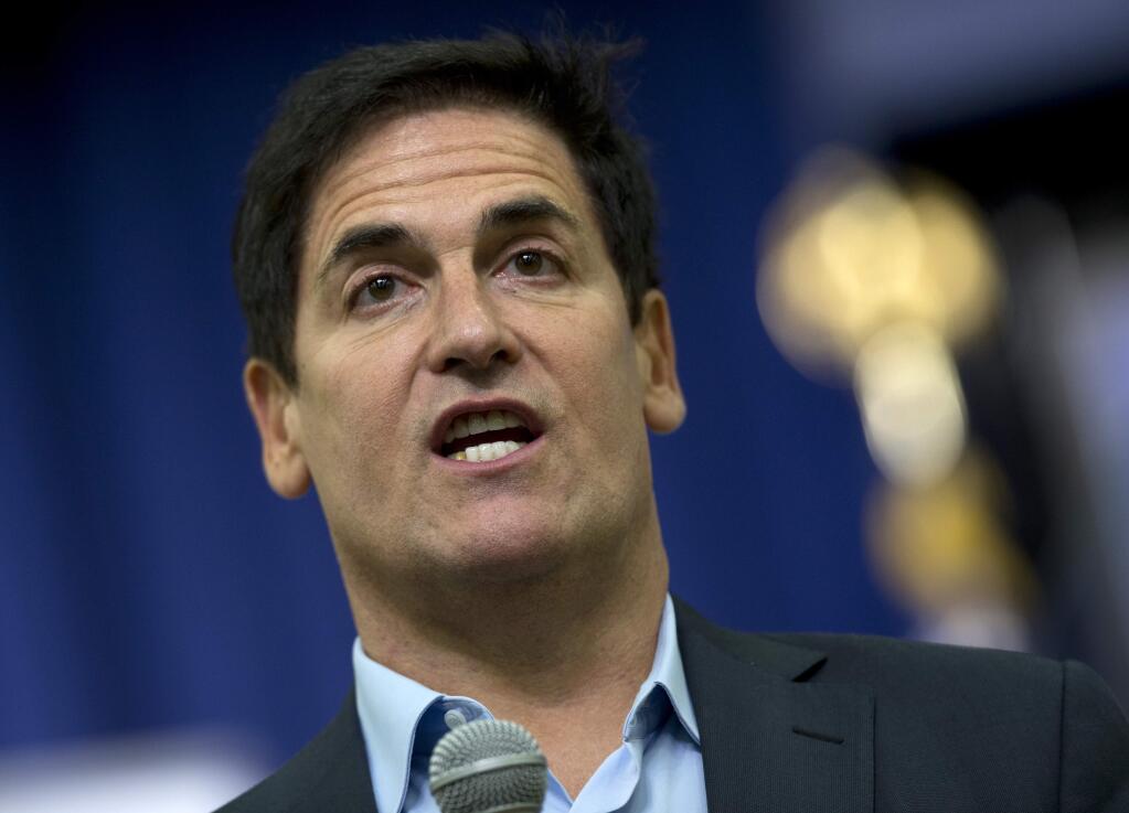FILE - In this May 11, 2015, file photo, Dallas Mavericks basketball team owner Mark Cuban answers questions from the audience before President Barack Obama spoke in the South Court Auditorium of the Eisenhower Executive Office Building on the White House complex in Washington. The NBA has fined Mark Cuban for commenting about the team's agreements with DeAndre Jordan and Wes Matthews during the league's free agent moratorium. NBA spokesman Tim Frank confirmed the penalty, which ESPN.com reported Tuesday, July 7, 2015, was for $25,000. (AP Photo/Carolyn Kaster), File
