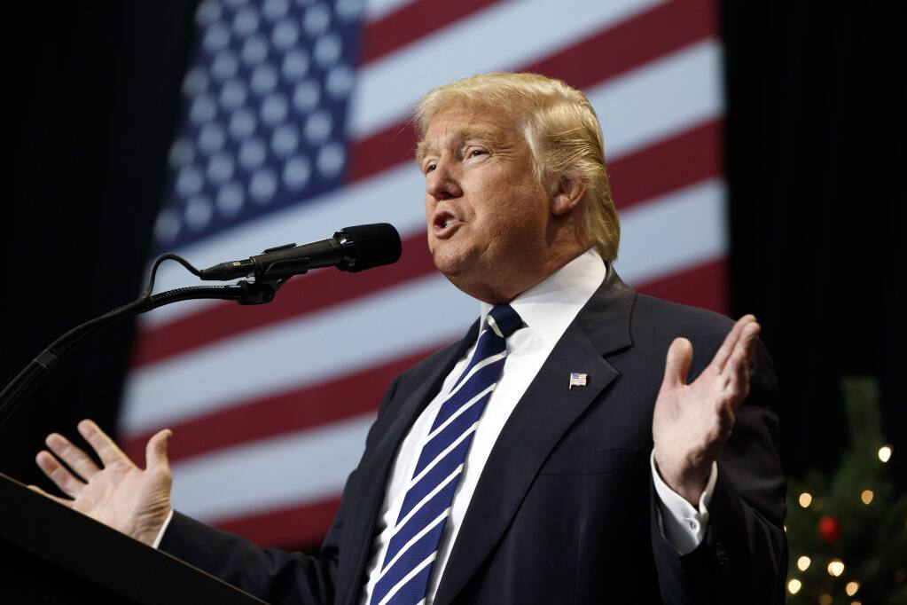 In this Dec. 13, 2016, photo, President-elect Donald Trump speaks during a rally at the Wisconsin State Fair Exposition Center in West Allis, Wis. Although pestered to a fare-thee-well to abandon Donald Trump, Republican electors appear to be in no mood for an insurrection in the presidential campaign's last voting ritual. (AP Photo/Evan Vucci)