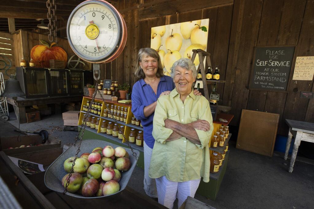 Sally Schmitt, founder of The French Laundry restaurant in Yountville, right, and her daughter Karen Bates have put the finishing touches on a cookbook they have been working on for the past 35 years at their Apple Farm near Philo in the Anderson Valley. (John Burgess/The Press Democrat)