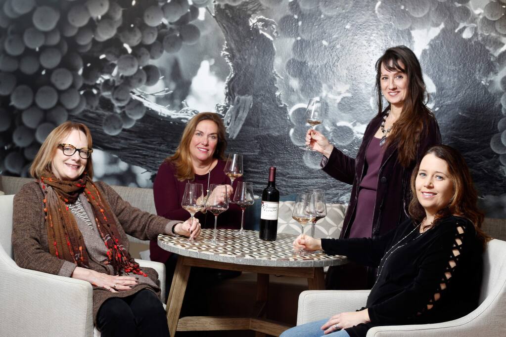 Wine Women co-founders, from left, Christine Mueller, Ellen Reich-Luchtel, Marcia Macomber, and Jackie Egidio at the Passagio Wines tasting room, in Sonoma, California, on Thursday, April 19, 2018. (Alvin Jornada / The Press Democrat)