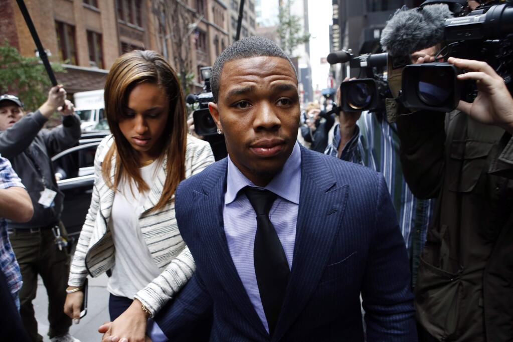 In this Nov. 5, 2014, file photo, Ray Rice arrives with his wife Janay Palmer for an appeal hearing of his indefinite suspension from the NFL in New York. Rice has won the appeal of his indefinite suspension by the NFL, which has been 'vacated immediately,' the NFL football players' union said Friday, Nov. 28, 2014. (AP Photo/Jason DeCrow, File)