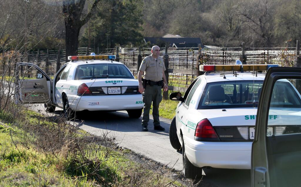 Sonoma County sheriff's deputies at the scene of the triple homicide in Forestville. (PD FILE, 2013)