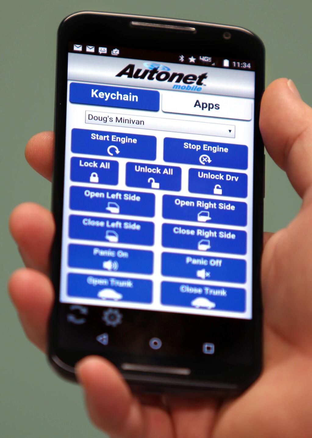The Autonet Mobile software and device allows drivers to send commands to their cars from their smartphones, as well as retrieve data from their vehicles.(Christopher Chung/ The Press Democrat)