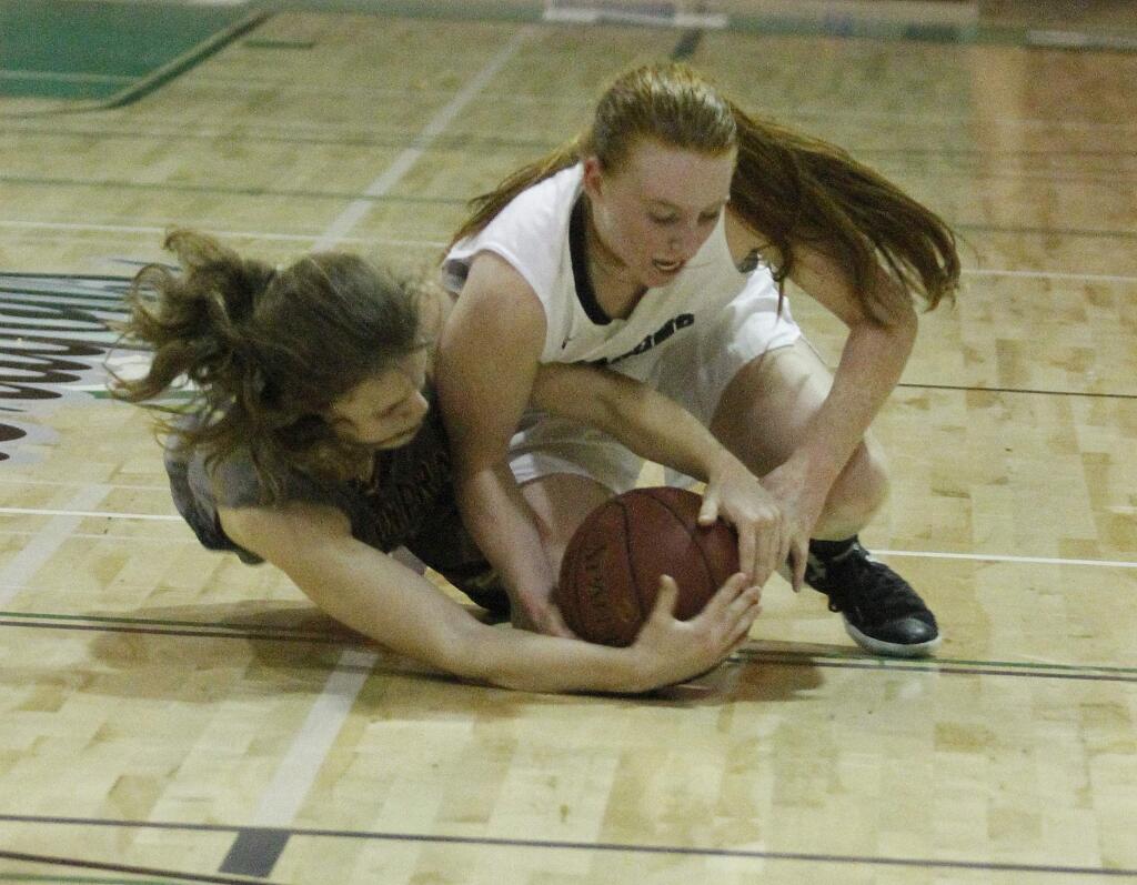 Bill Hoban/Index-TribuneSonoma's Kayla Field dives for a loose ball in the Tuesday, Feb. 21, North Coast Section game against Alhambra. Sonoma sunk six three-pointers in the third quarter to turn a close game into a blowout.