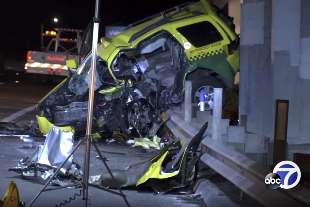 This Thursday, Oct. 3, 2019, photo taken from video provided by KGO-TV shows the scene of a car crash that authorities say killed four people on a highway in San Francisco. The California Highway Patrol says the collision happened Thursday about 12:30 a.m., just minutes after people started calling authorities to report a Volkswagen sedan driving south in the northbound lanes of Highway 101. (KGO-TV via AP)