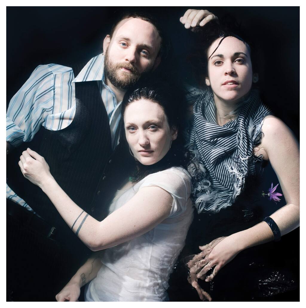 From left, Josh Staples (of The Velvet Teen), Sara Sanger and Julia Lancer formed the Santa Rosa-based band The New Trust in early 2003, first as a vehicle for a handful of short, upbeat & dark, punk-tinged-pop-songs penned by Staples, but over the years have evolved TNT into a true collaborative vision of the three. (THENEWTRUST.COM)
