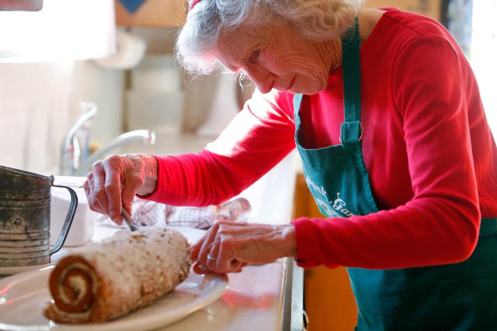 Photos by Alvin Jornada / The Press DemocratEugenia “Jean” Brown, 90, makes her Pumpkin Roll, filled with cream cheese, at her home in Santa Rosa.