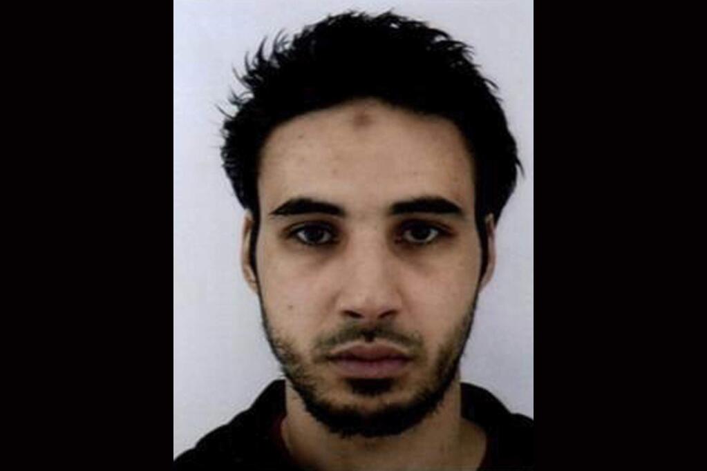 FILE - This undated file handout photo provided by the French police, shows Cherif Chekatt, the suspect in the shooting in Strasbourg, France. The French government spokesman says security forces are trying to catch the suspected shooter dead or alive, Thursday Dec. 13, 2018, two days after an attack near Strasbourg's Christmas market. (French Police via AP, File)