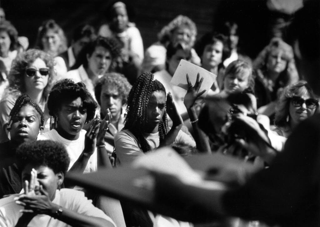 Women at Sonoma State University cheer on Norma McCorvey aka Jane Roe as she speaks to a noon time rally crowd on the rights of women to choose a safe and legal abortion. (Vern Fisher/ The Press Democrat, 1989)