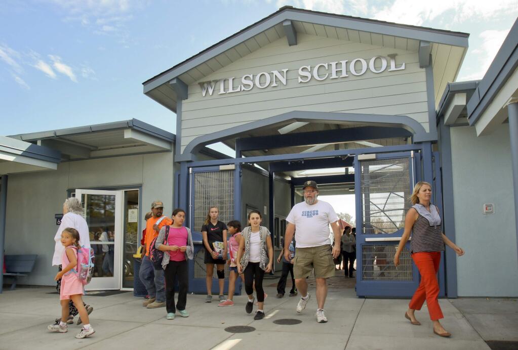 Students and parents flow through the new gateway at Wilson School Petaluma as they go home after school on Monday, September 28, 2015. (SCOTT MANCHESTER/ARGUS-COURIER STAFF)