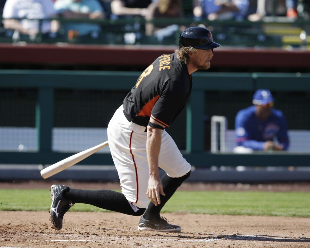 San Francisco Giants' Hunter Pence (8) grounds out to Chicago Cubs' Tommy La Stella during the fourth inning of a spring training baseball game Thursday, March 5, 2015, in Scottsdale, Ariz. (AP Photo/Darron Cummings)
