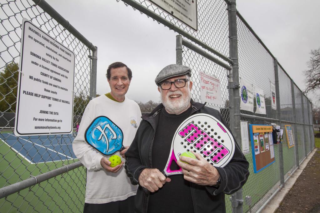 Doubles trouble: Mike Giangreco and Simon Blattner, armed for pickleball and paddle tennis respectively, are on a mission to bring tennis's little siblings to the Valley. (Photo by Robbi Pengelly/Index-Tribune)