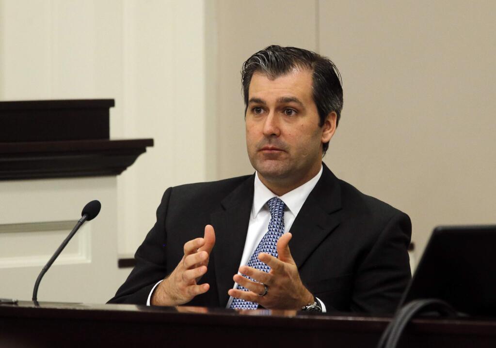 FILE - In a Nov. 29, 2016 file photo, former North Charleston police officer Michael Slager testifies during his murder trial at the Charleston County court in Charleston, S.C. Slager was sentenced to 20 years in prison Thursday, Dec. 7, 2017, for 2015 fatal shooting of unarmed black motorist Walter Scott. (Grace Beahm/Post and Courier via AP, Pool, File)
