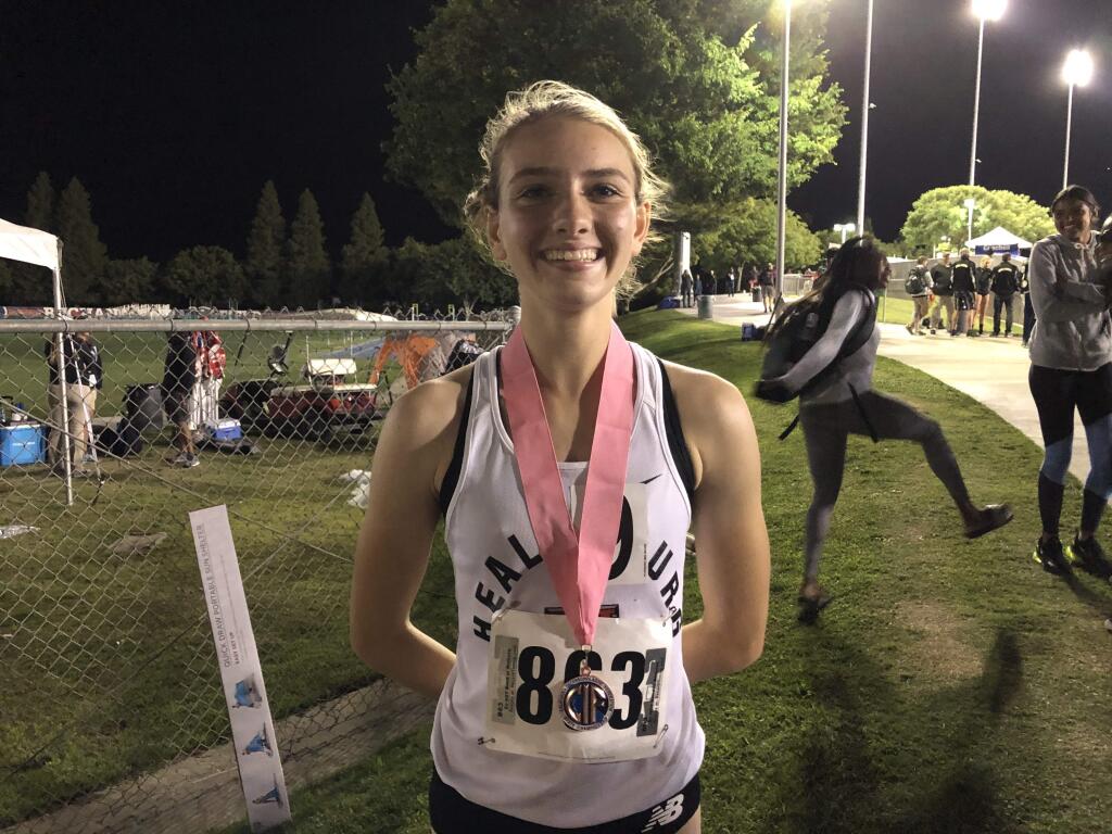 Healdsburg's Gabby Peterson finished on the podium twice at the CIF state track and field championships on Saturday at Clovis, taking fifth in the 3,200 and sixth in the 1,600. Peterson will continue her track career at Oregon State. (KERRY BENEFIELD / THE PRESS DEMOCRAT)