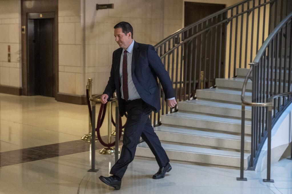 Rep. Devin Nunes, R-Calif., walks to a secure area of the Capitol in Washington, Tuesday, Dec. 3, 2019. The House released a sweeping impeachment report outlining evidence of what it calls President Donald Trump's wrongdoing toward Ukraine, findings that will serve as the foundation for debate over whether the 45th president should be removed from office. (AP Photo/Patrick Semansky)