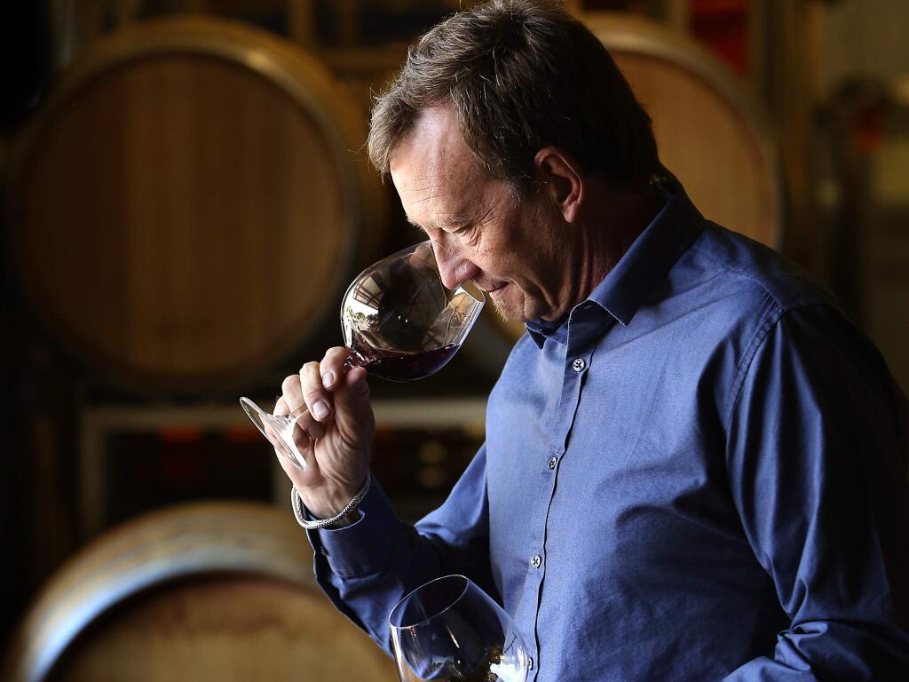 Guy Davis of Davis Family Vineyards samples wine from the barrel in his Healdsburg production facility. (JOHN BURGESS/ PD FILE)