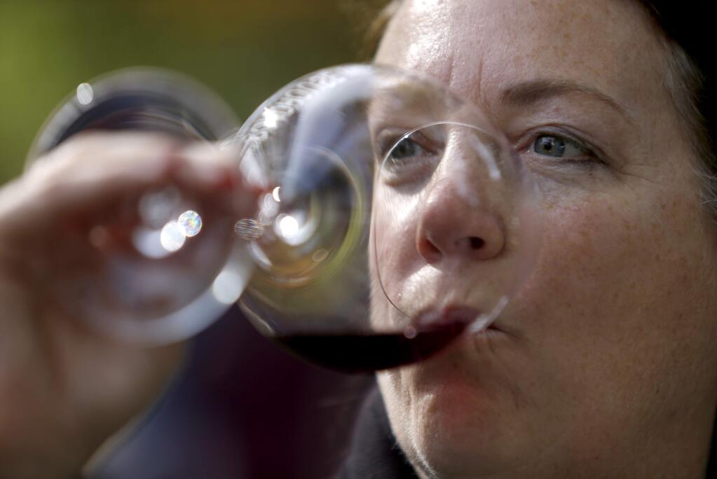 Michele Ross of Luli Wines during the Pinot on the River Festival at the Healdsburg Plaza on Sunday, October 23, 2016 in Healdsburg, California . (BETH SCHLANKER/ The Press Democrat)