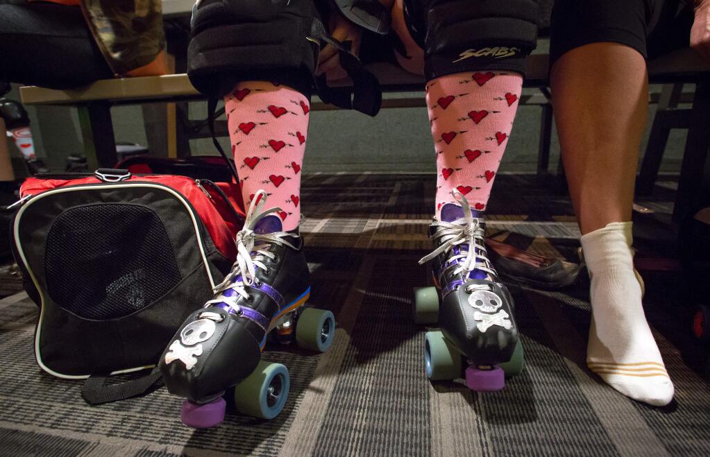 Resurrection Roller Girls suit up during an open practice at Cal Skate in Rohnert Park, Calif. Tuesday, February 14. 2017. Resurrection Roller Girls, is a women's flat track competitive and recreational roller derby league. (Jeremy Portje / For The Press Democrat)