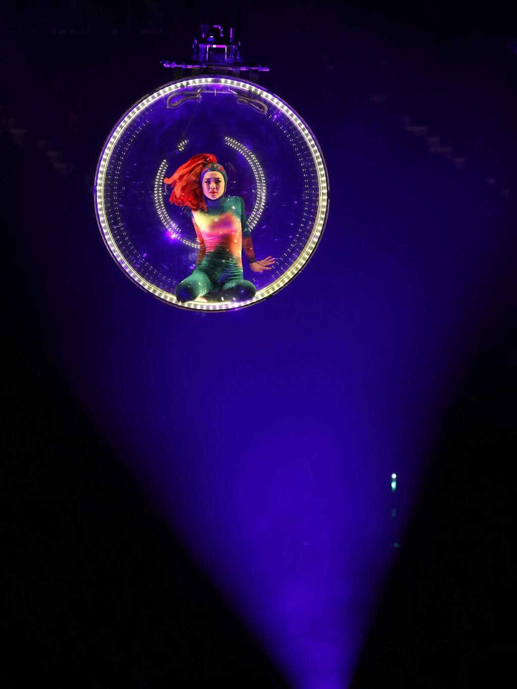An acrobat performs in a transparent ball suspended above the floor during the final show of the Ringling Bros. and Barnum & Bailey Circus, Sunday, May 21, 2017, in Uniondale, N.Y. (AP Photo/Julie Jacobson)